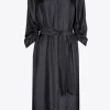 Glänzendes Blusenkleid